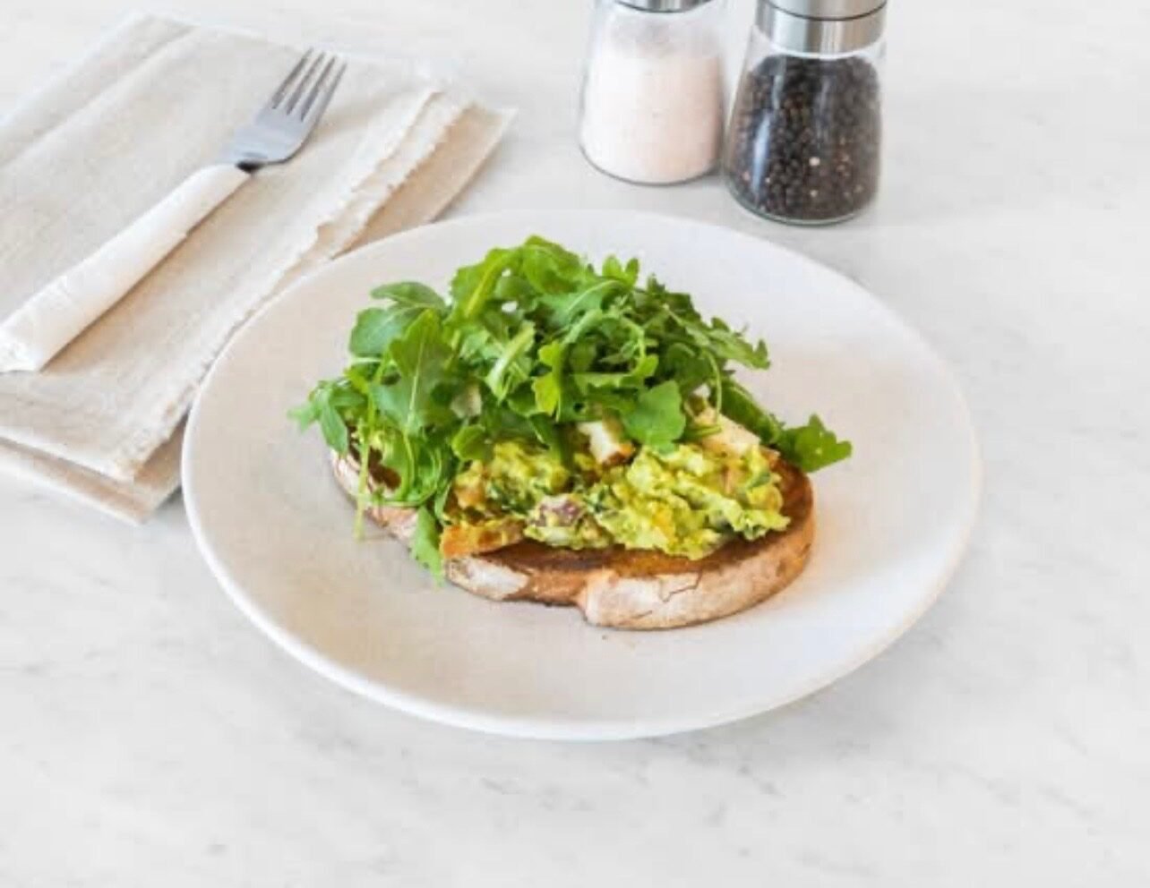 Avocado toast with rocket