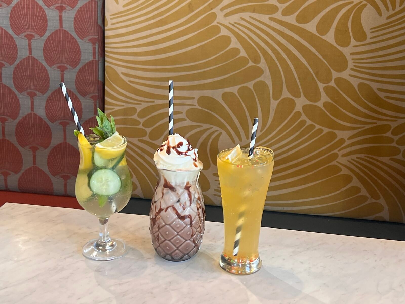 Three specialty drinks lined up