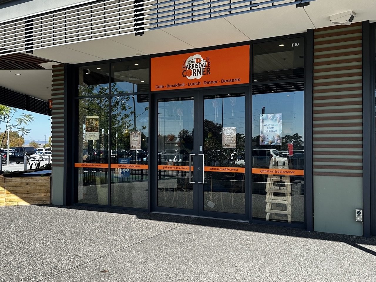 Front door signage of The Harrisdale Corner